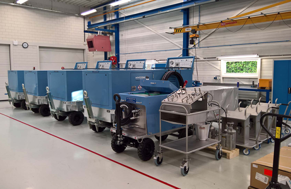 Hydraulic ground support for assembly line